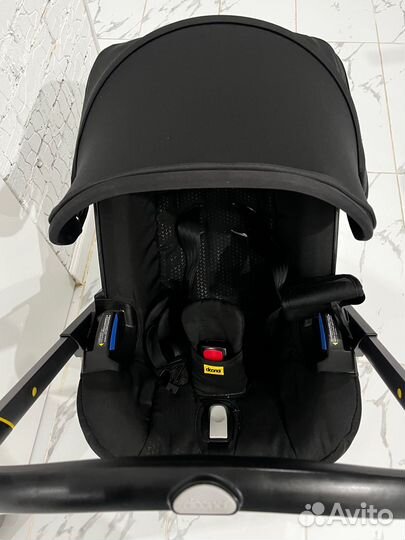 Doona Plus, nitro black с базой isofix