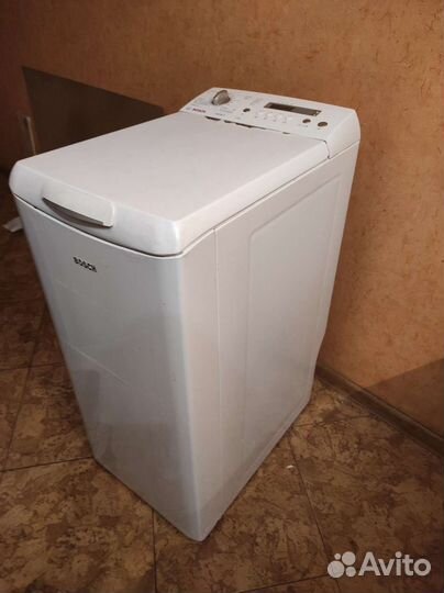 Стиральная машина с вертикальной загрузкой