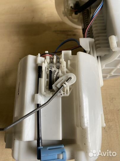 Насос топливный Toyota Corolla E15