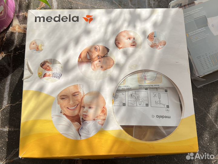 Молокоотсос medela swing maxi&calma