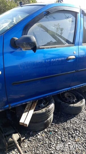 Дверь левая передняя на Рено Логан,Лада Ларгус