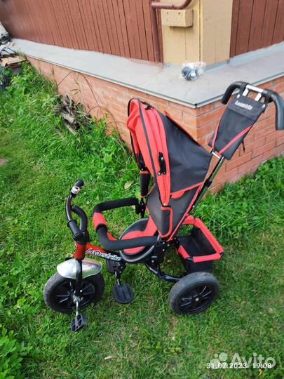 Трехколесный велосипед с ручкой
