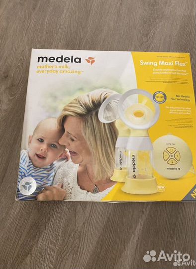 Молокоотсос medela электрический