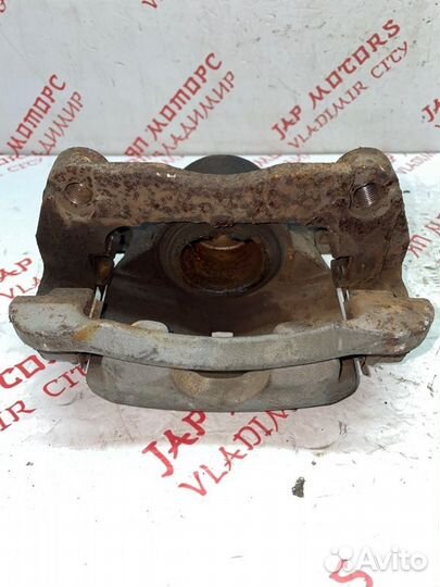 Суппорт тормозной передний правый Nissan X Trail