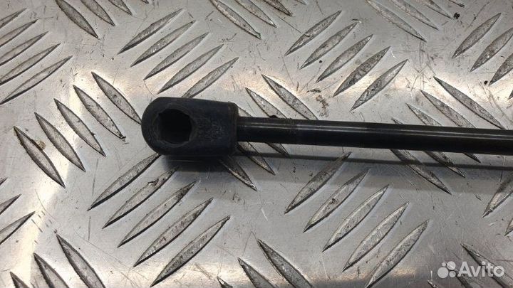 Амортизатор двери багажника задний левый Mazda