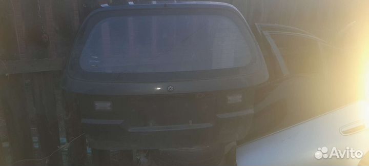 Крышка багажника Caldina