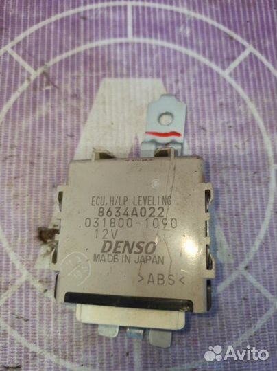 Блок управления корректора фар Mitsubishi