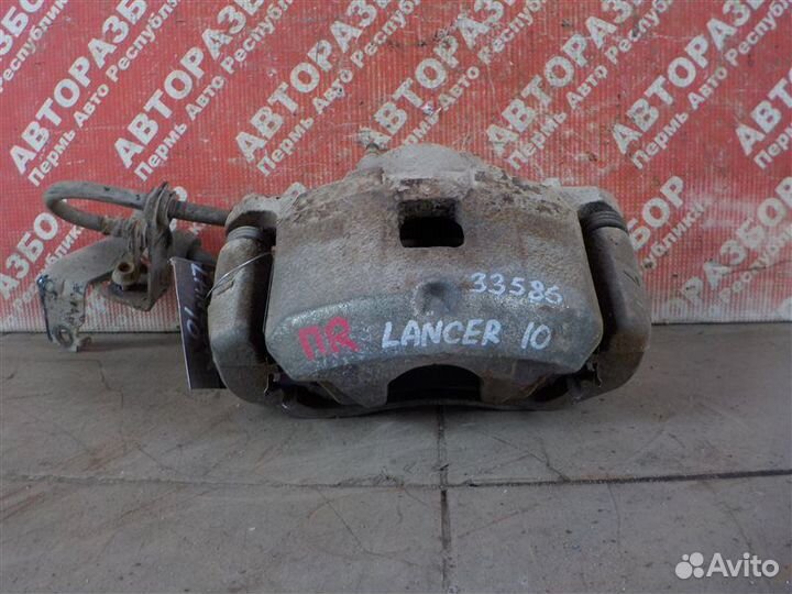 Суппорт тормозной передний правый Mitsubishi