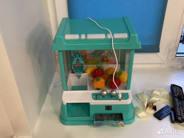 Игрушка автомат с монетками