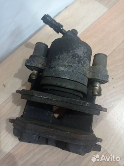 Суппорт тормозной передний левый Skoda Fabia