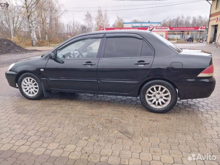 Mitsubishi Lancer 1.6 МТ, 2005, 289 000 км
