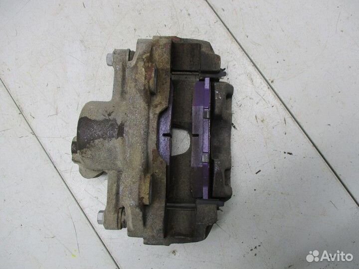 Суппорт передний левый Skoda Rapid