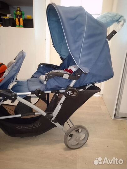 Коляска для двойни погодок