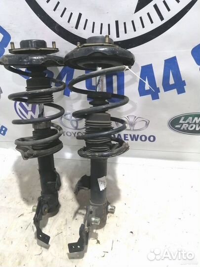 Стойка амортизатора передняя Nissan Primera P12