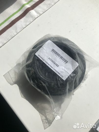 Опорный подшипник переднего амортизатора на Мазда