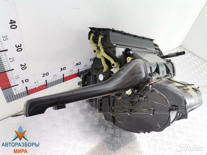 Отопитель в сборе (печка) Opel Astra 13227511