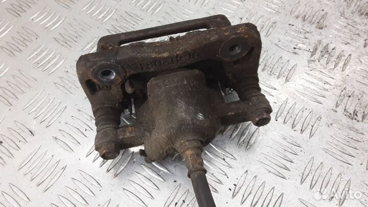 Суппорт задний правый Kia Magentis рест. 2004