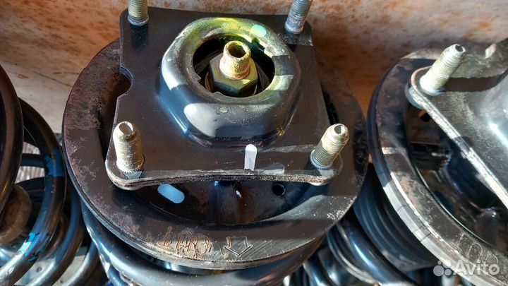 Escape Maverick передние стойки в сборе оригинал