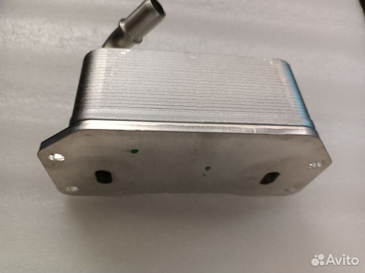 Радиатор масляный Geely Atlas