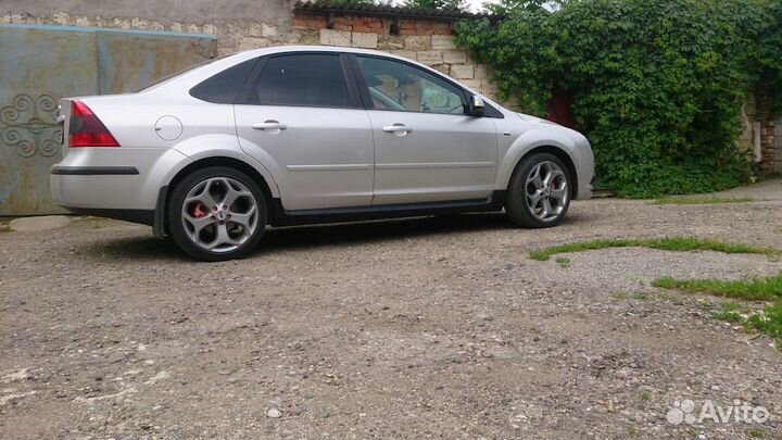 Накладки на пороги ST ford focus 2 4-5D абс