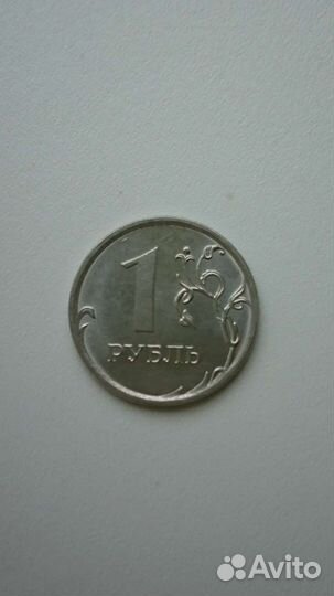 Брак монеты 1 рубль 2016 года наплыв в виде крыла