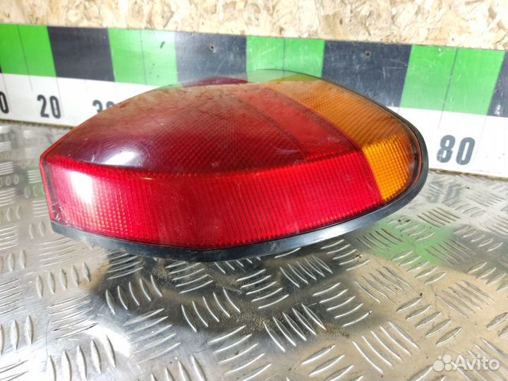 Фонарь задний левый Mitsubishi Carisma 2000 2003