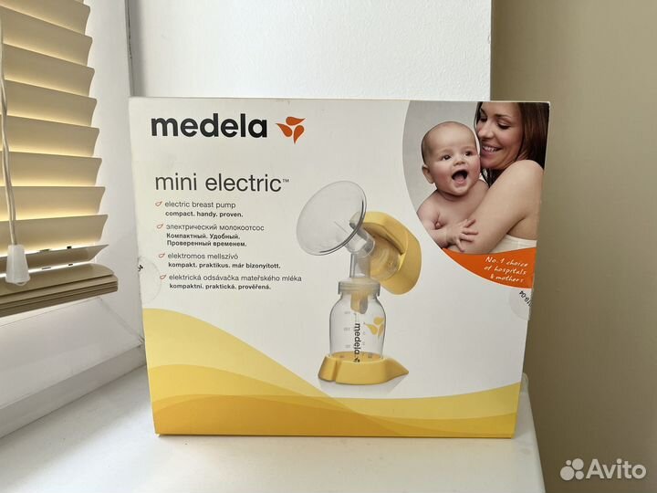 Молокоотсос medela электрический