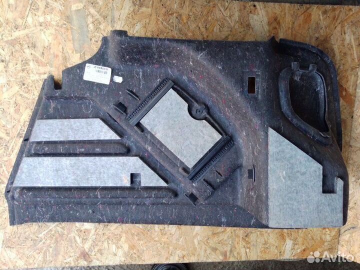 Обшивка багажника левая Opel Astra J седан 1.6