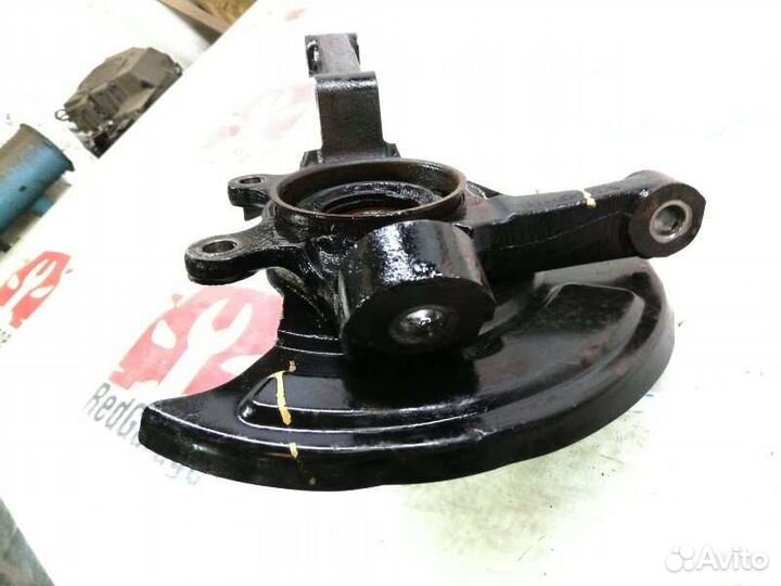 Кулак поворотный передний левый Nissan Elgrand