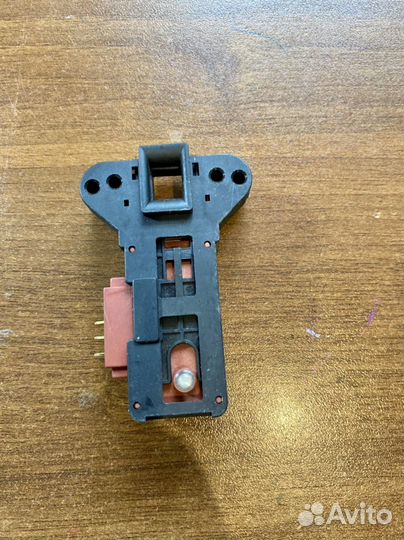 Устройство блокировки люка стиральной машины