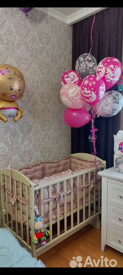 Детская кроватка с маятником