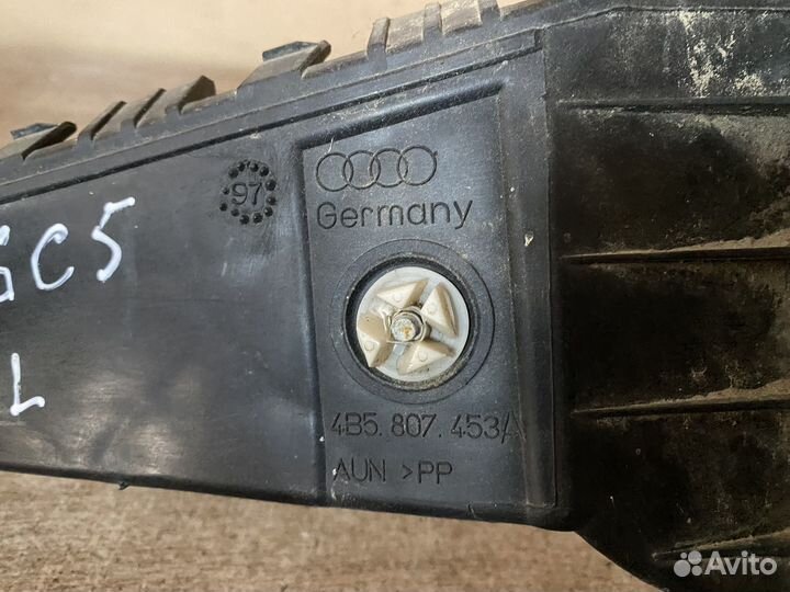 Кронштейн заднего бампера левый Audi A6C5