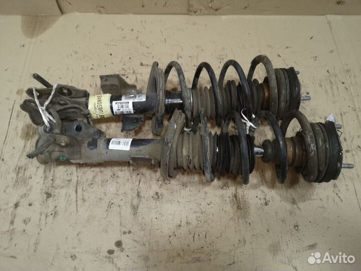 Стойки амортизаторов перед mazda 2 2010