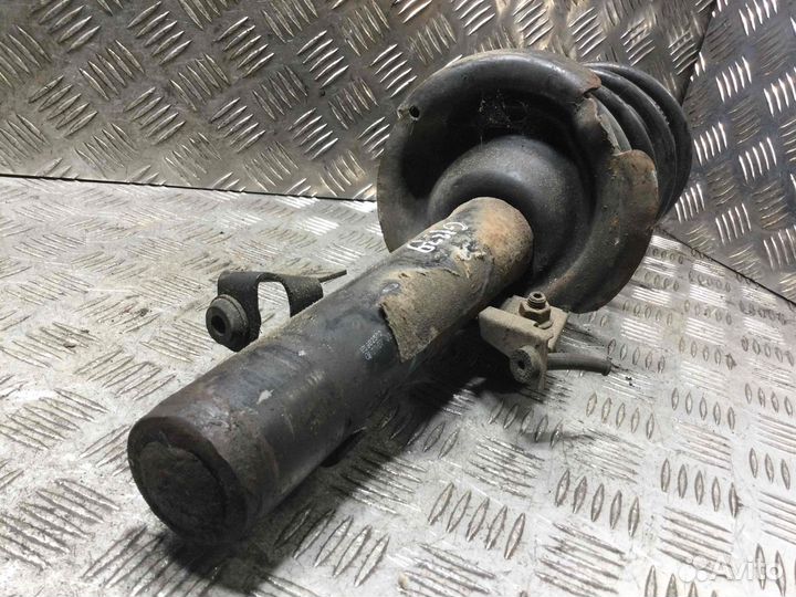 Стойка передняя левая Ford Focus e5602502 hxdb