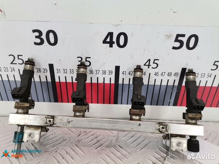 Форсунка Opel Corsa D 2007 55562250