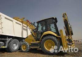 Услуги эксковатора-погрузчика