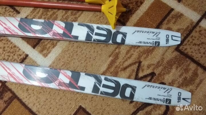 Лыжные ботинки и лыжи