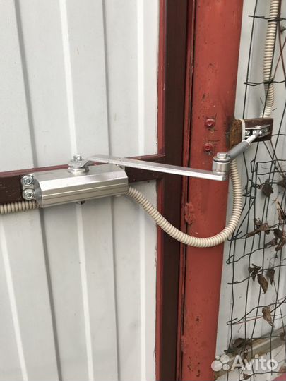 Монтаж электропривода на ворота, видеонаблюдение