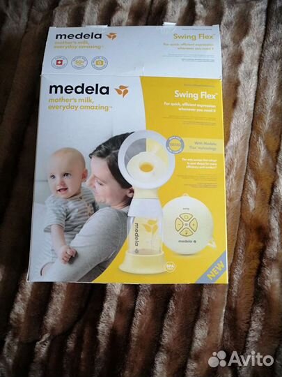 Молокоотсос medela swing flex электрический