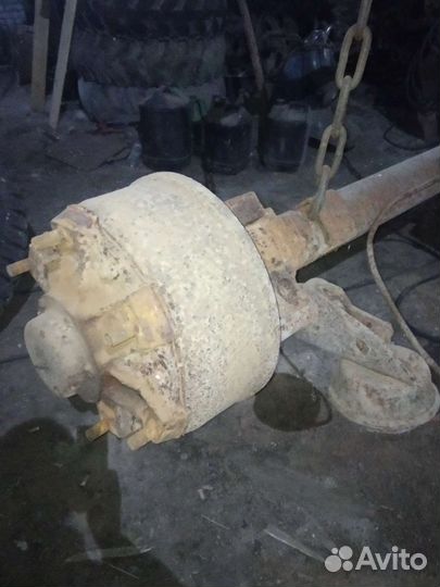 Ось тракторного прицепа