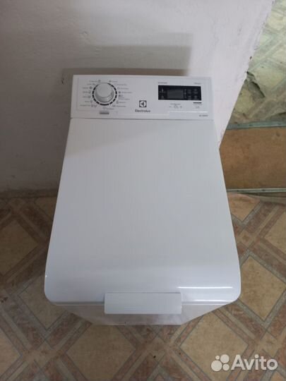 Стиральная машина с вертикальной загрузкой