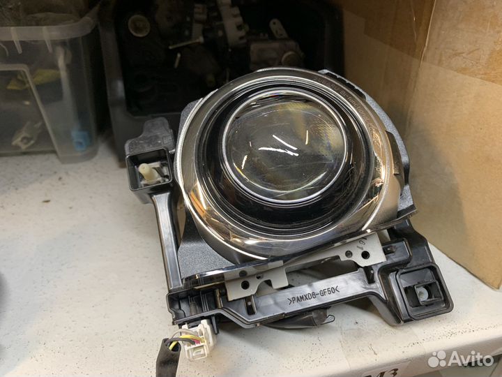 Линза головного света фары Subaru