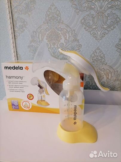 Молокоотсос medela ручной
