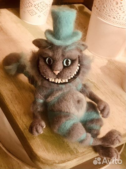 Чеширский кот из Асилы в стране Чудес