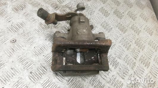 Суппорт тормозной задний правый KIA CEE'D 2 (JD)