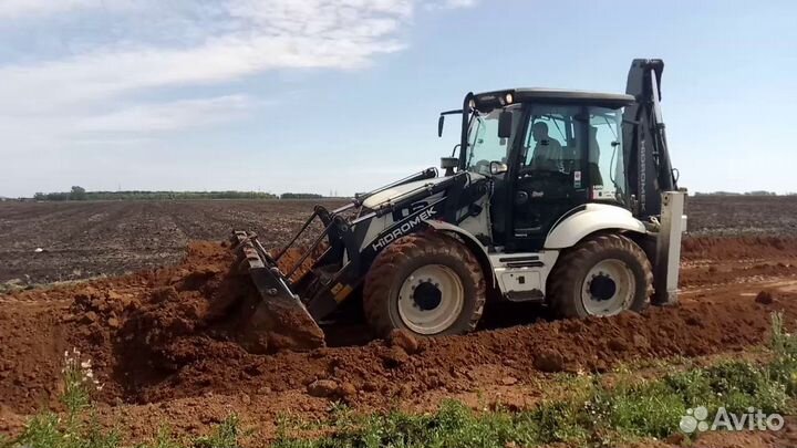 Услуги экскаватора погрузчика Hidromek 102S