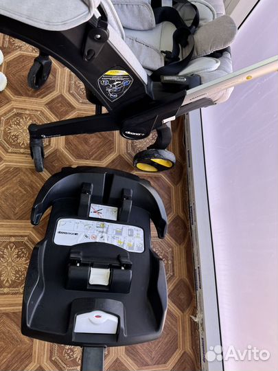 Коляска-автокресло doona с базой Isofix