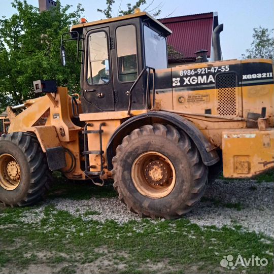 Фронтальный погрузчик амкадор