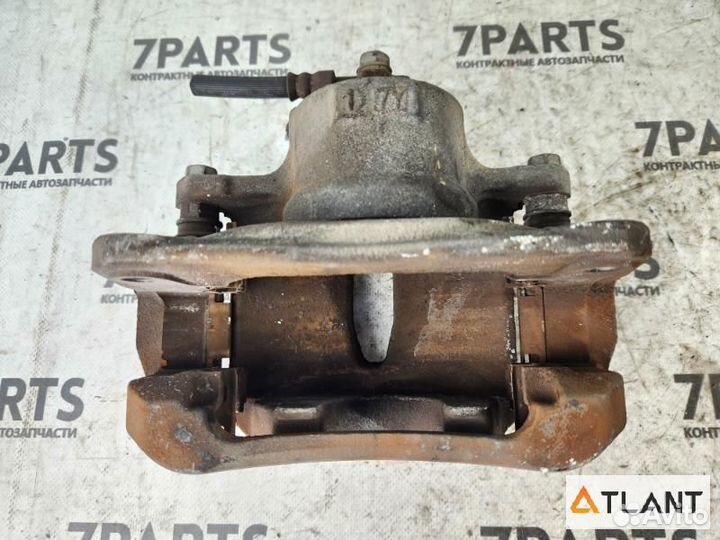 Суппорт передний левый toyota isis