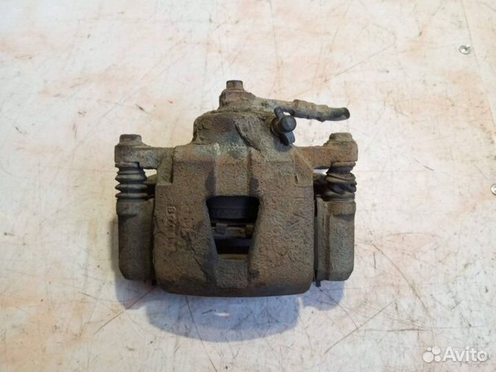 Суппорт тормозной передний левый Chevrolet Lanos